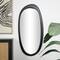 51" Black Wooden Abstract Oval Framed Wall Mirror